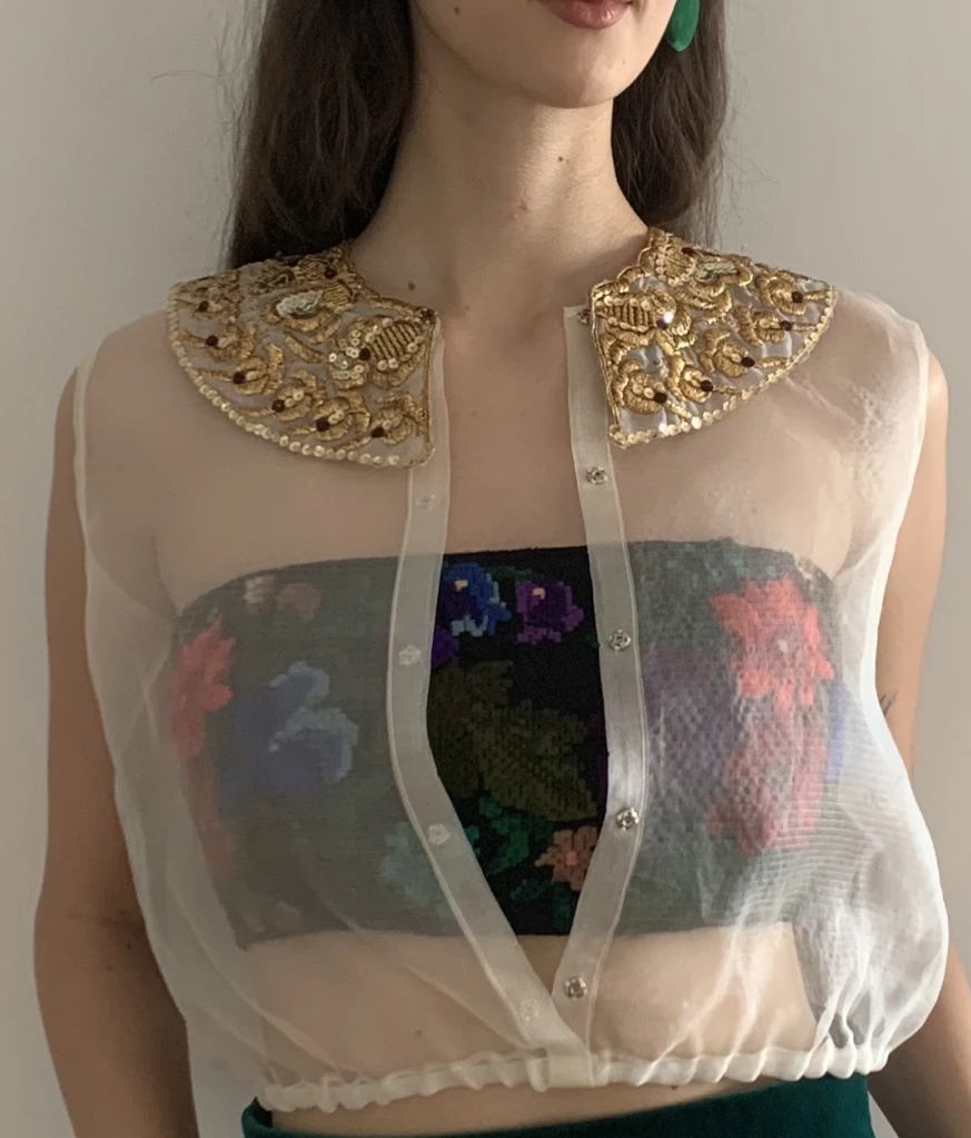 Organza top with golden collar and buttons